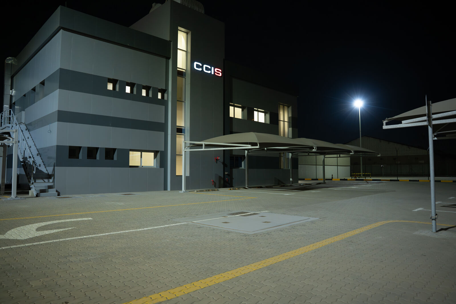 Facility exterior at night